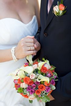 bouquet and wedding ring of bride and groom