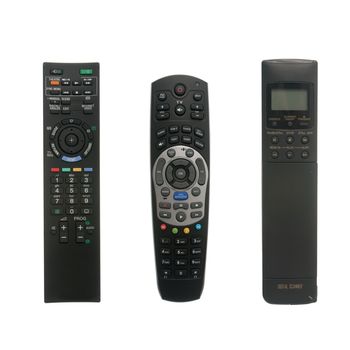 Three remote control devices isolated on white background.