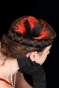 Beautiful 1920 hair style with headband and feathers