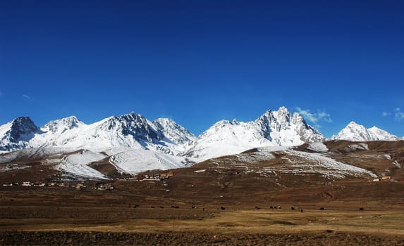 Landscape of mountains covered by snow in winter