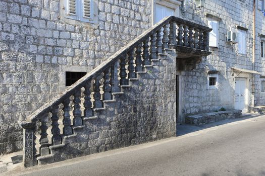 Old stone staircase outside original stone house in Montenegro