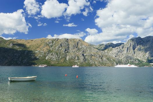 Boats on Kotor bay surrounded by mountains