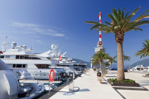 Luxury expensive motor yacht sterns at dock in Montenegro
