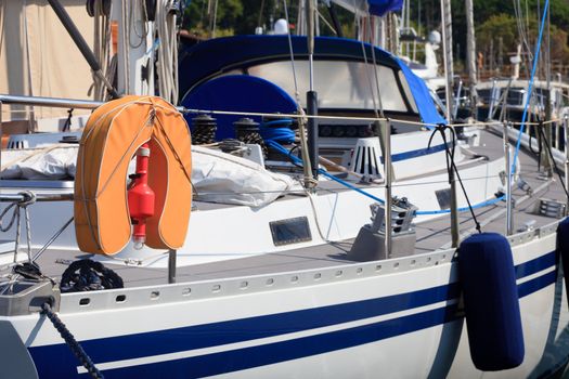 lifevest and teak deck of a luxury sailboat