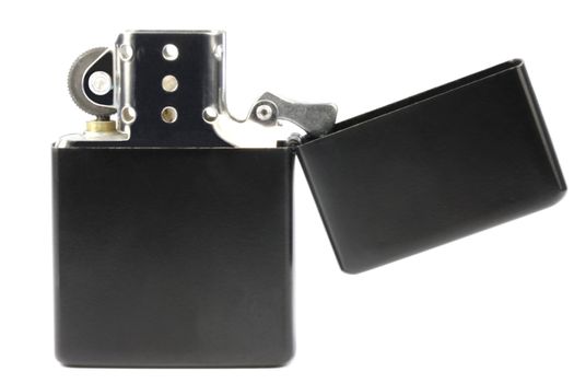 Black petrol type lighter on a white background