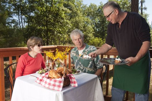couple enjoying dinner at an outdoor restaurant