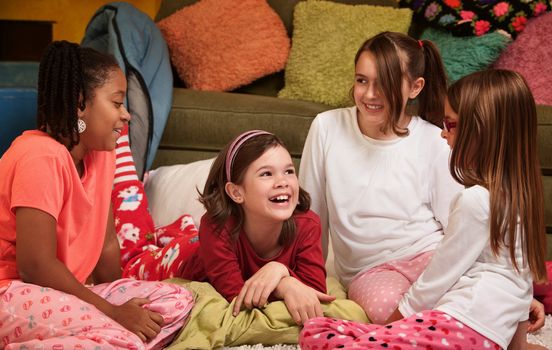 Group of happy young girls at a sleepover