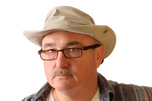 older man with spectacles on and a floppy hat isolated on white