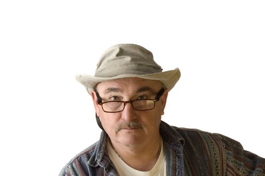 older man with spectacles on and a floppy hat isolated on white