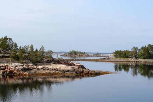 Several capes and islands in a quite summer sea
