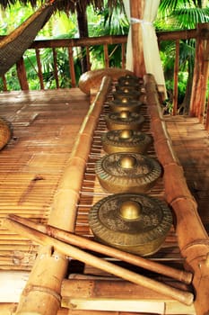 a row of brass gong percussion  instrument also known as kulintang
