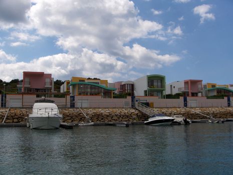 Colourful resort condos along a bay in the Algarve region of Portugal