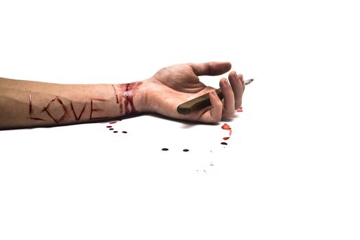 A bloody knife and a cut wrist, isolated on white and LOVE cut across the arm. This image has innumerous uses like accidents, domestic violence, suicide, murder, hate, etc...
