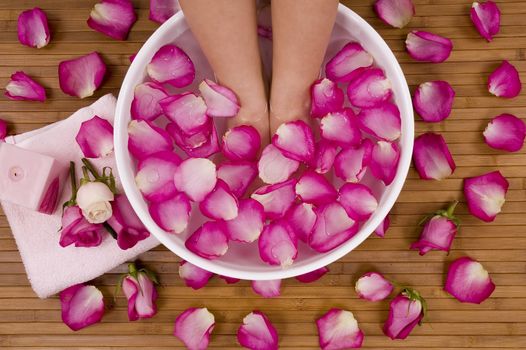 Spa Treatment with aromatic roses, petals, and candle