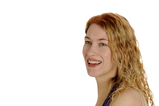 smiling young woman with tangled blond hair on a white background