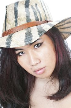 young asian girl wearing a safari hat