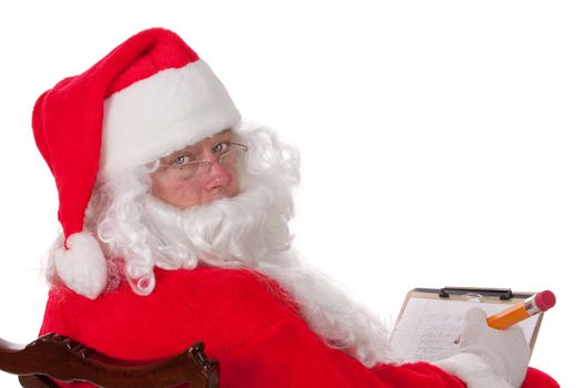 Santa claus making list of names of good children
