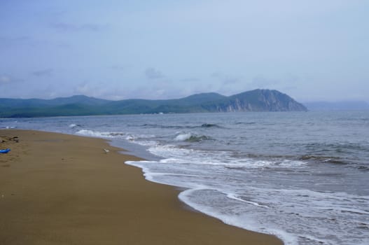 High resolution image. Beach of sea of Japan in Russia. Coastal fading.