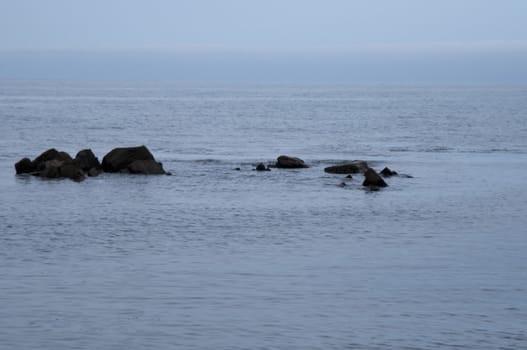 High resolution image. Beach of sea of Japan in Russia. Coastal fading.