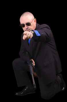 Gangster or Government agent, FBI agent, over a black background