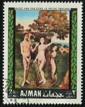 AJMAN - CIRCA 1972: Eve and Adam in gardens Eden, circa 1972.