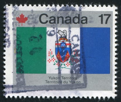 CANADA - CIRCA 1979: Designs: Provincial and Territorial flags. Yukon Territory, circa 1979.