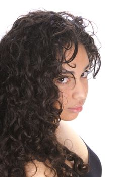 young hispanic woman with curly hair isolated on a white background