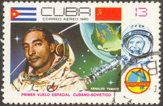 The first Cuban cosmonaut. The scanned stamp. Planet the Earth.
