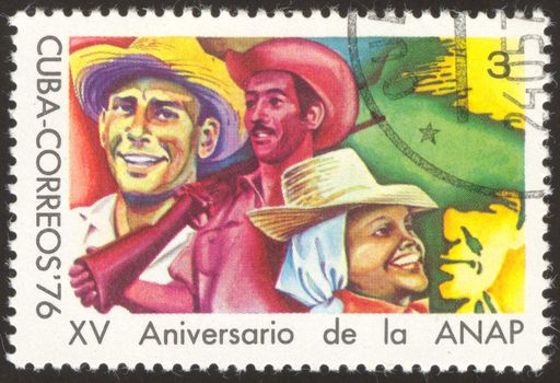 The scanned stamp. The Cuban mark. Two men and one woman.