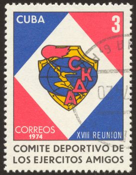 The scanned stamp. The Cuban stamp. The sportsman bears a torch.