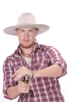 Cowboy fanning a single action revolver pointed at the camera