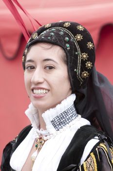 young woman in traditional elizabethan era spanish costume