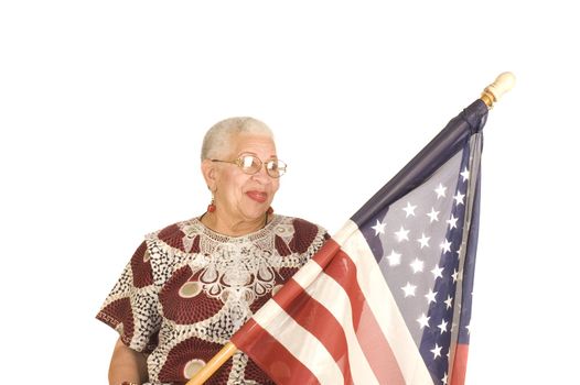 Attractive female American patriot with flag isolated over white