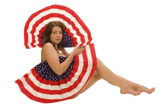Attractive female American with flag isolated over white