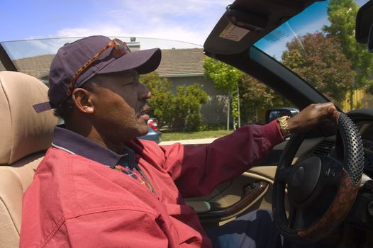 African American driving car