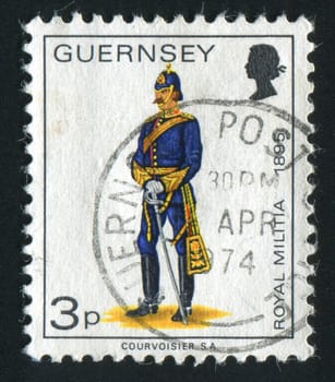 GUERNSEY - CIRCA 1974: The soldier in an ancient uniform, circa 1974.