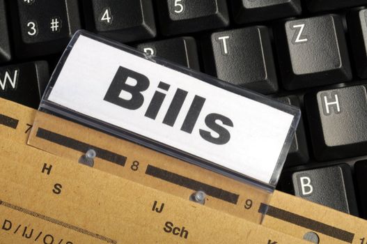 bill or bills word on paper riders showing payment or debts concept