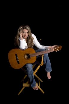 female musician resting, isolated on black 