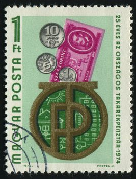 HUNGARY - CIRCA 1974: Bank Emblem Coins and Banknote, circa 1974.