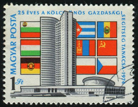 HUNGARY - CIRCA 1974: Comecon Building Moscow and Flags, circa 1974.