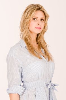 A fashion blond girl in pajamas shirt