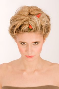 Portrait of a woman with vegetables in your hair