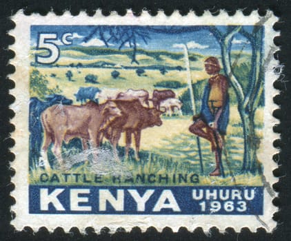 KENYA - CIRCA 1963: The Kenyan man against mountains, circa 1963.