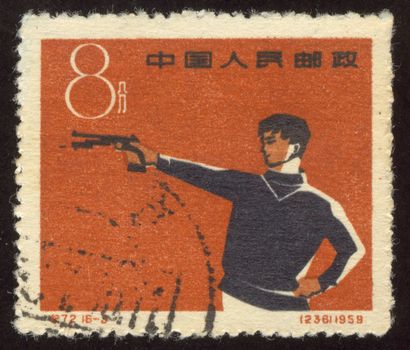 The scanned stamp. The Chinese stamp. The Chinese sportsman shoots at the purpose.