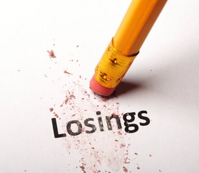losing lose or luck concept with word and eraser on white background