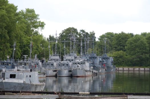 High resolution image. The military ships on parking in harbour.