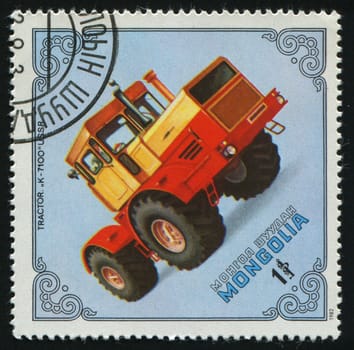 MONGOLIA - CIRCA 1982: Old tractor. K-7110, USSR, circa 1982.