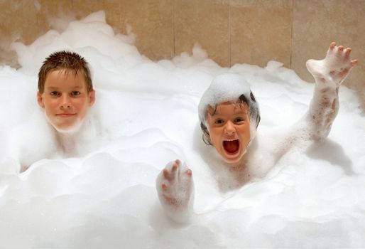 Couple of friends take a fun an bath foam