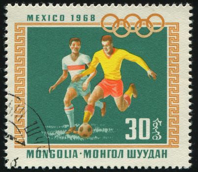 MONGOLIAN - CIRCA 1968: Olympic Rings and soccer, circa 1968.