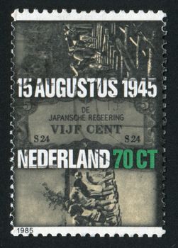 NETHERLANDS - CIRCA 1985: Dutch women in Japanese prison camp, Japnese occupation currency, building of the Burma Railway, circa 1985.